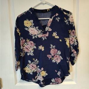 Medium size blouse with flower pattern